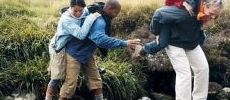 230x100_four_walkers_cross_river