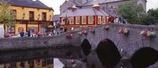 230x100_bridge_river_town