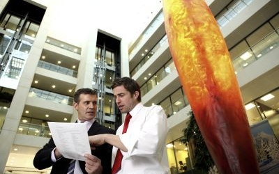 Business men outside building