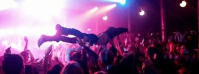 Crowd-surfer at open-air concert