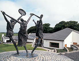 Brú Ború offers a dining experience centered around fresh Irish cuisine, home baking and local produce. Sculpture of irish dancers outside the Brú Ború centre