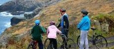 230x100_four_cyclists_admiring__coastal_view